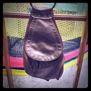 Nine West Convertible backpack with zips galore!